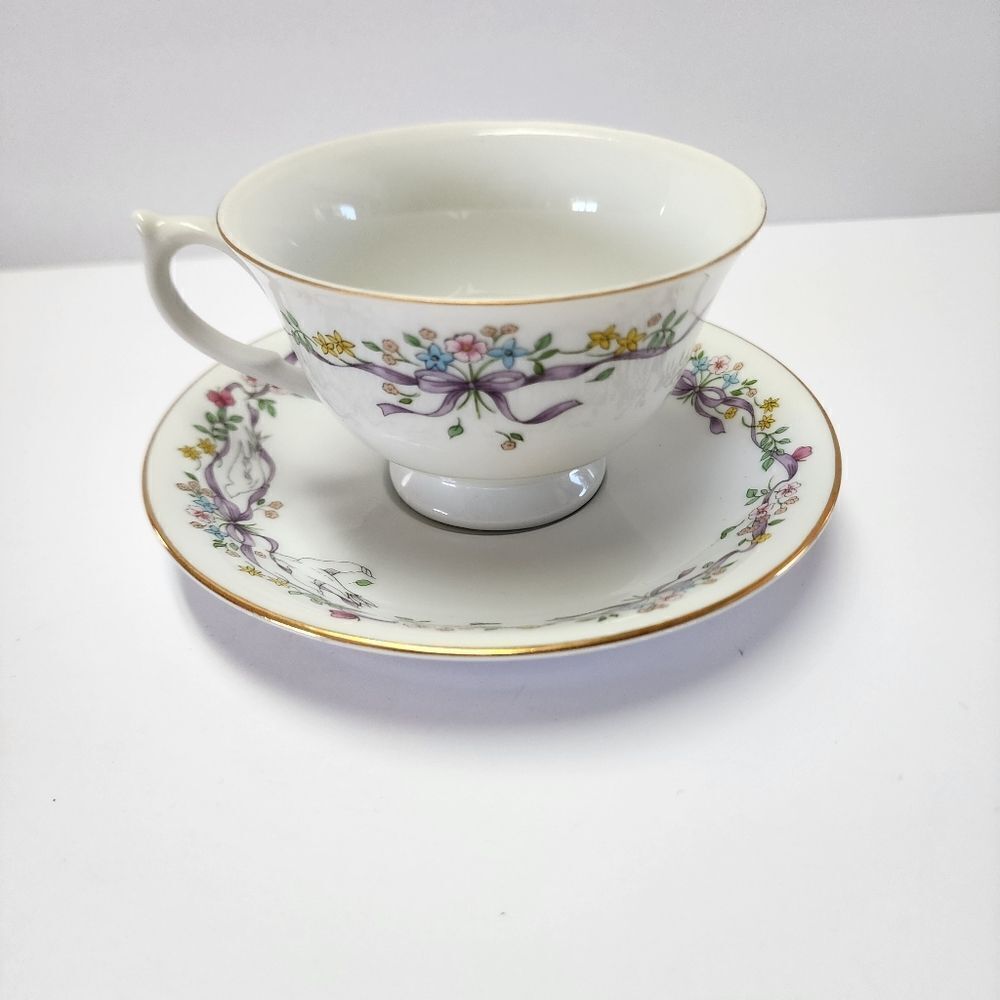 A Teleflora Gift Fine Porcelain Tea Cup and Saucer